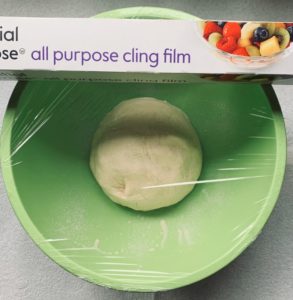 best simple pizza dough cling film