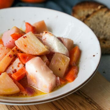 A picture of some swede and turnip diced in a bowl
