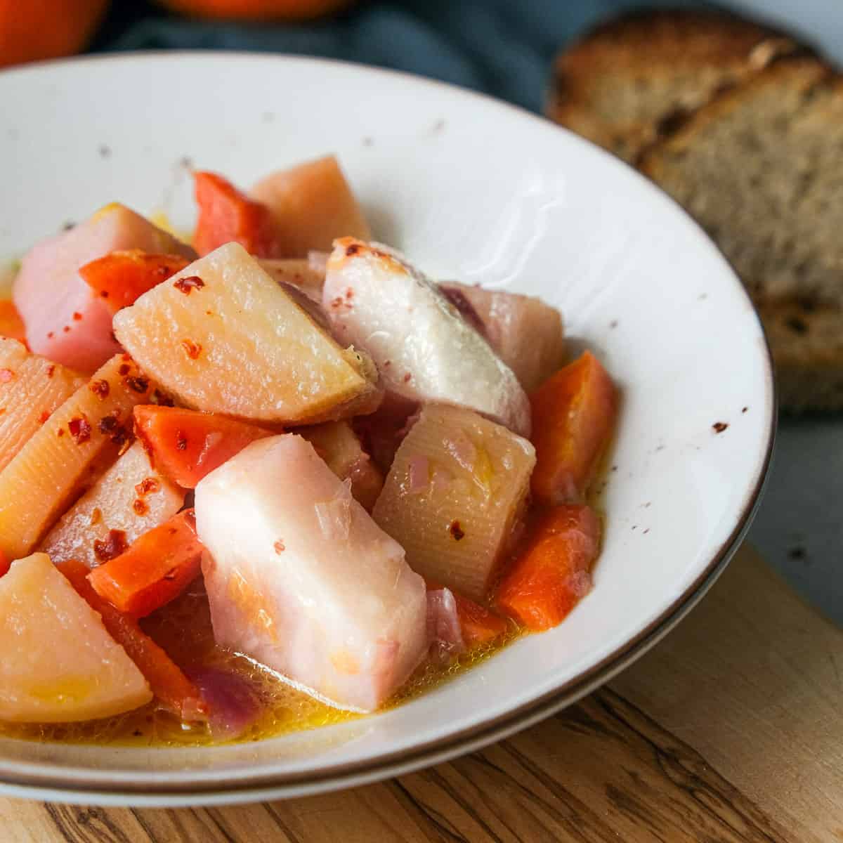A picture of some swede and turnip diced in a bowl
