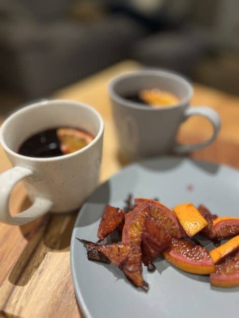 Super Easy Mulled Wine with mugs and fruit