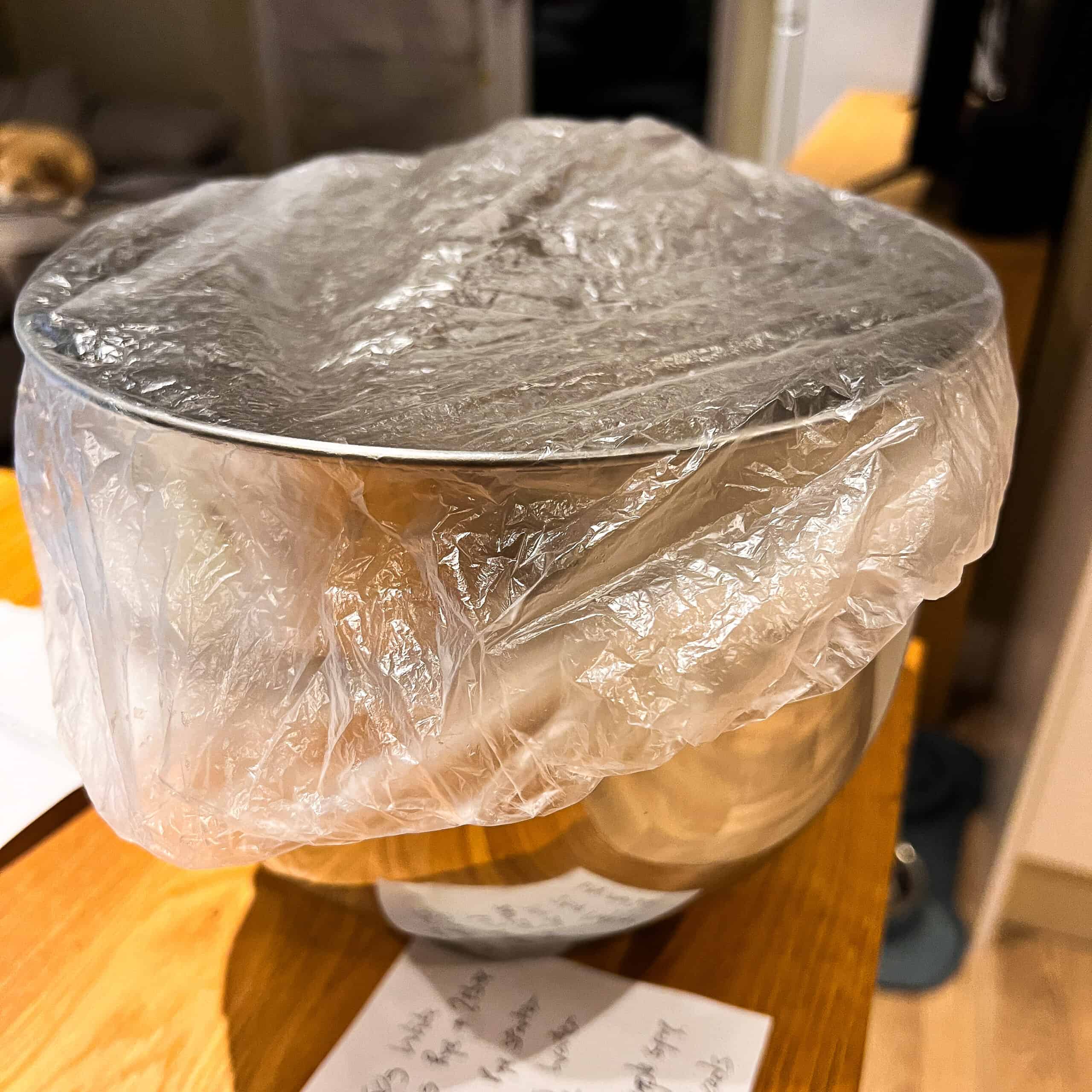rye and maple syrup bread leave covered in bowl
