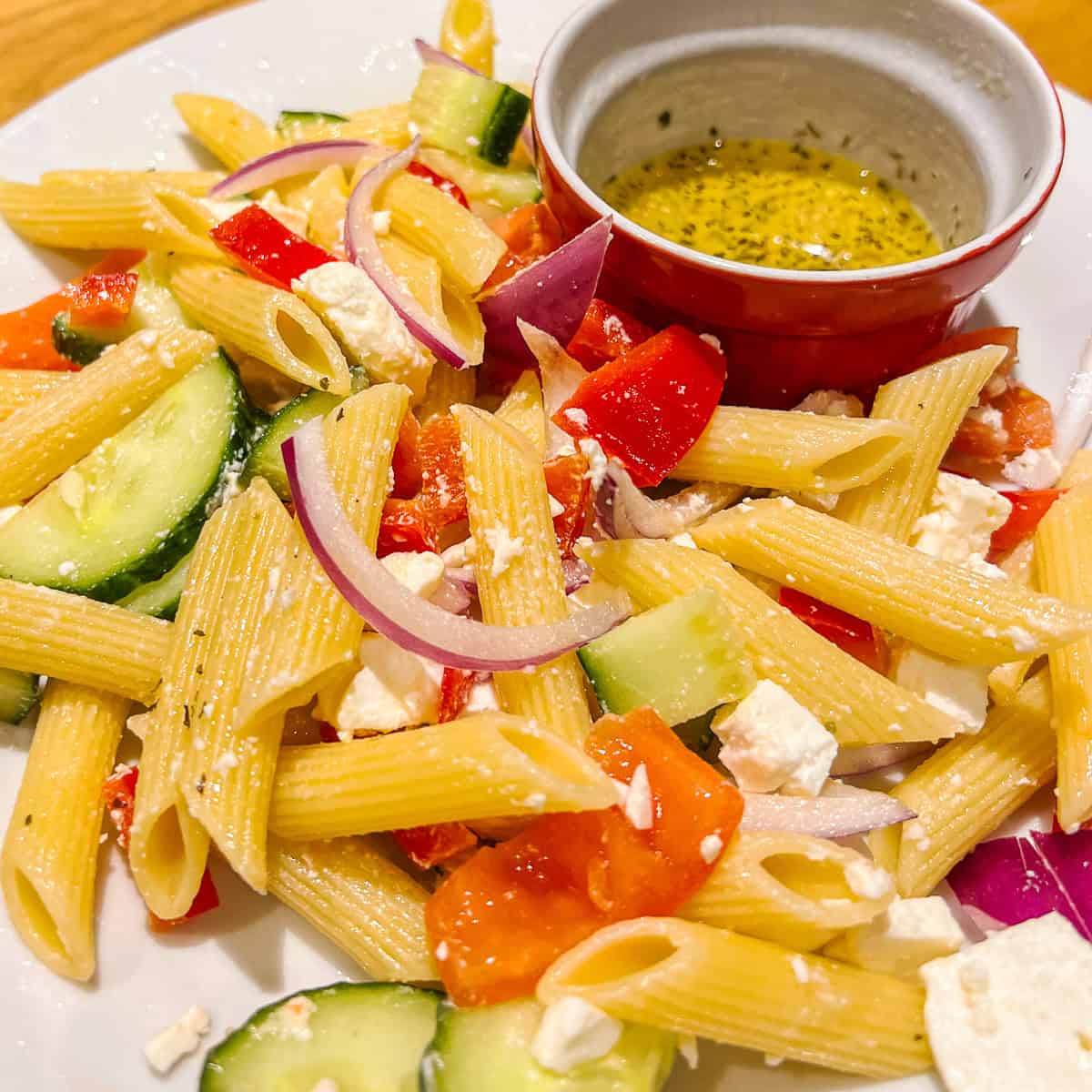 greek pasta salad with feta on a plate