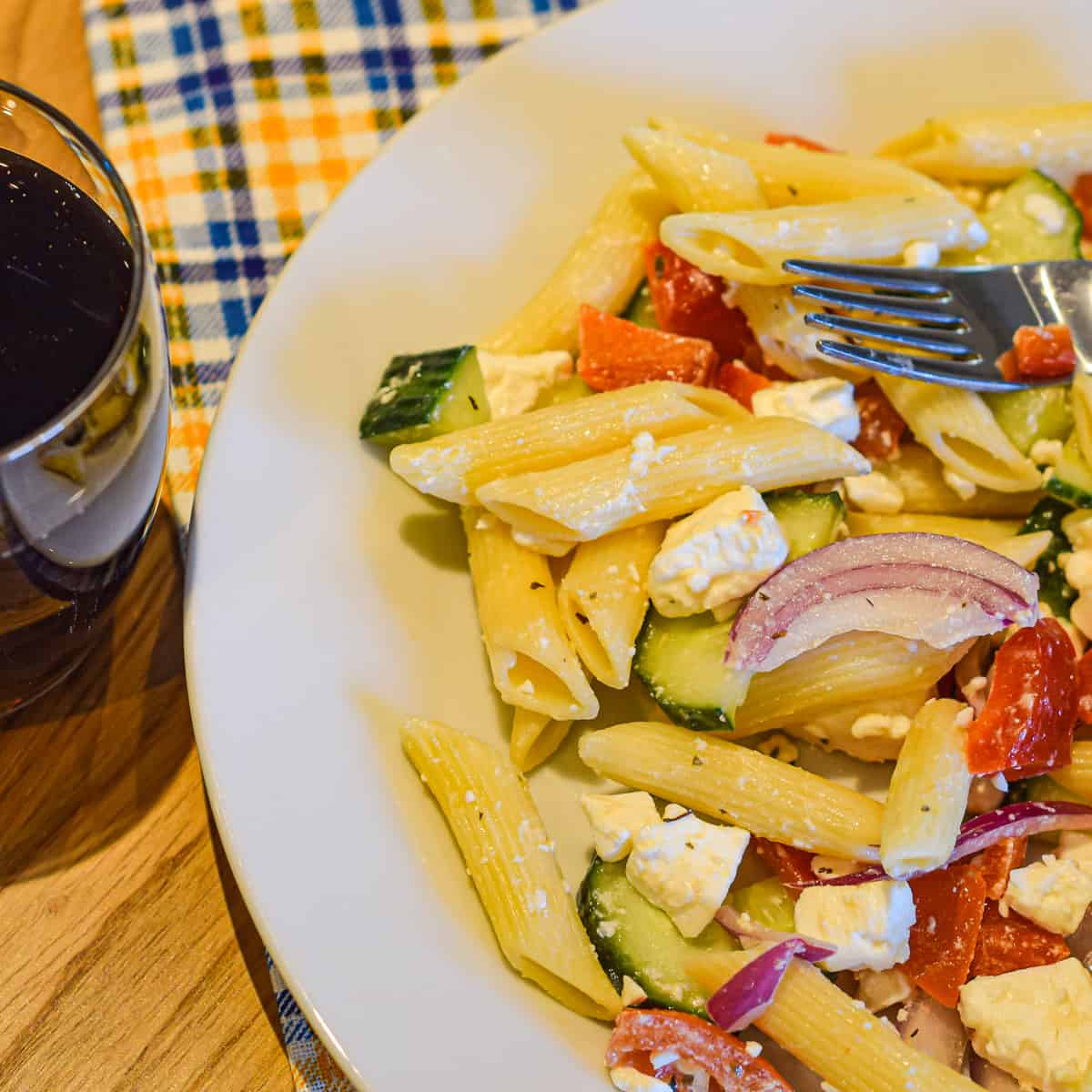 greek pasta salad with feta with a coke