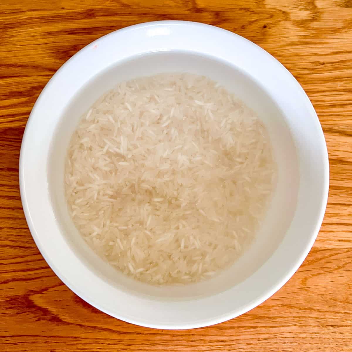 Rice in a bowl soaking.