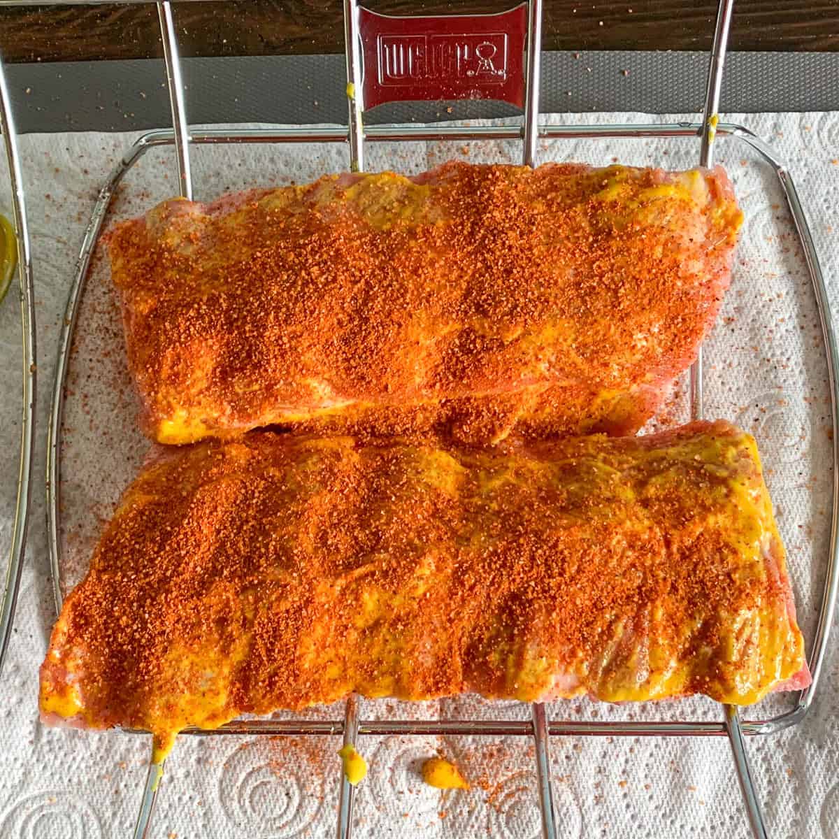 Raw rack of ribs prepared for the BBQ.
