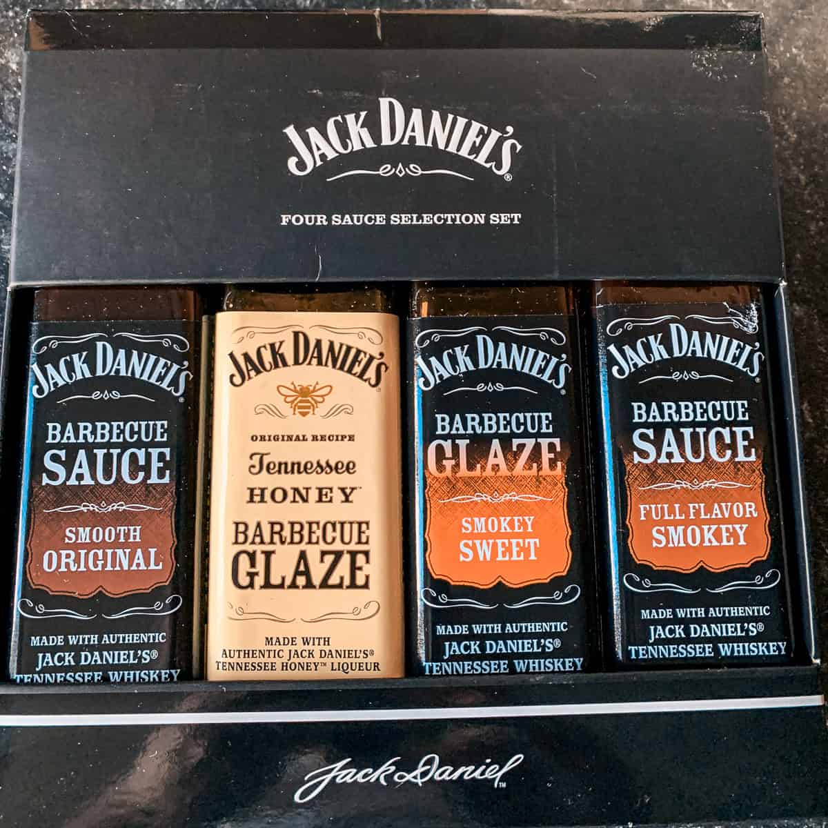 A gift box of Jack Daniels BBQ sauces selection.