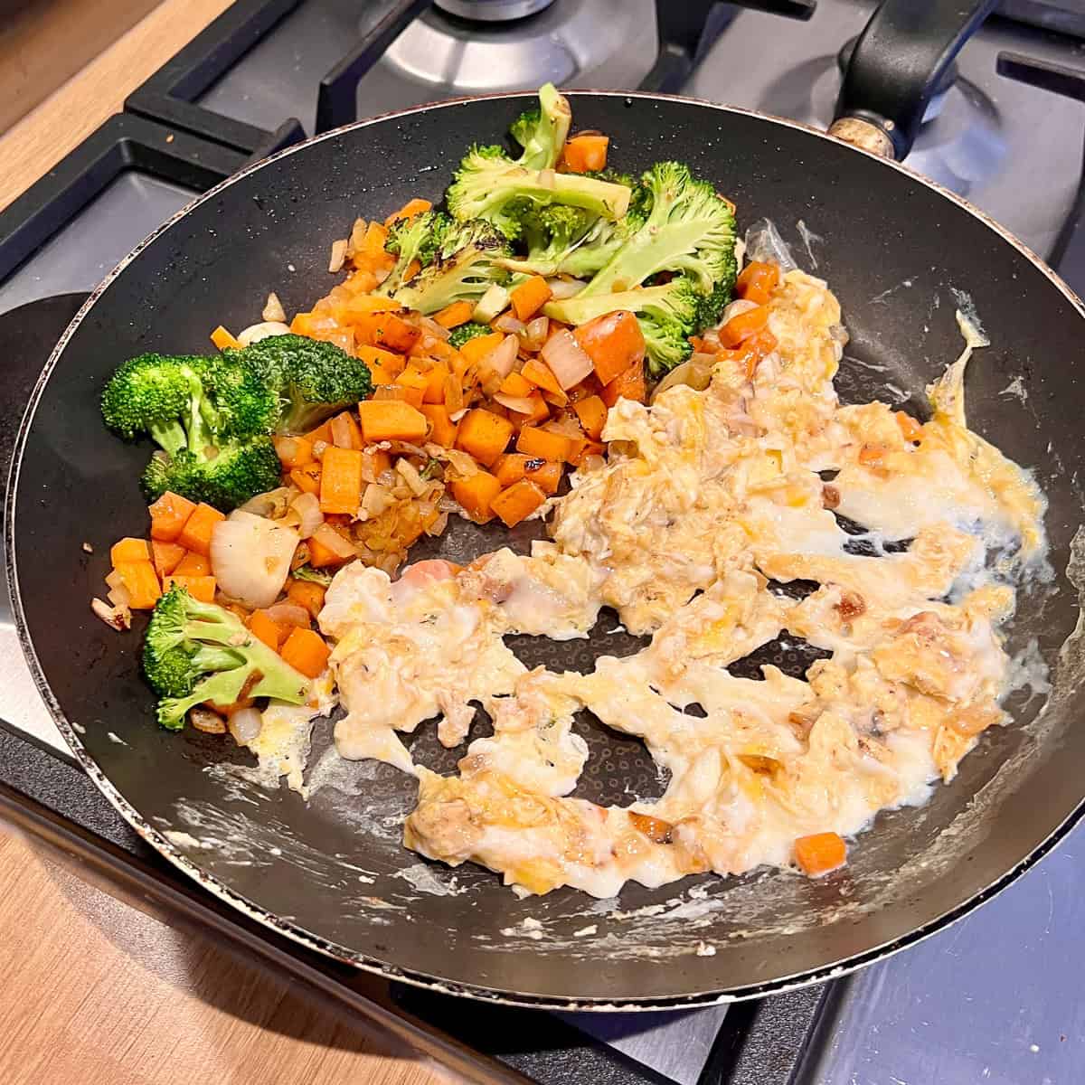 Egg added and cooked to a frying pan.