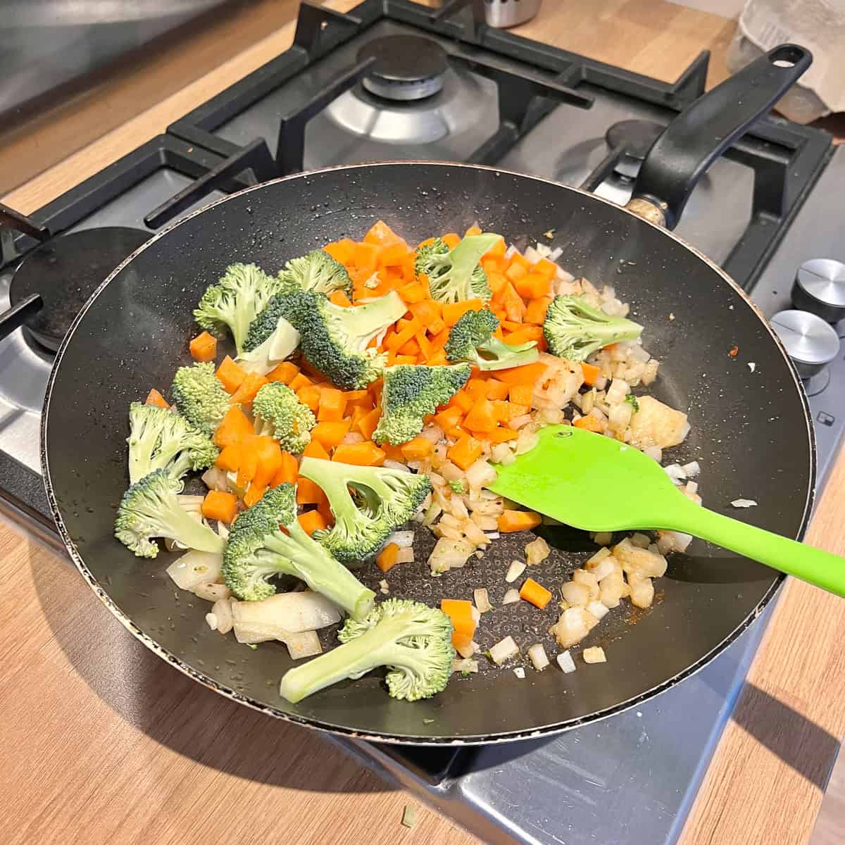 Vegetables in a frying pan.