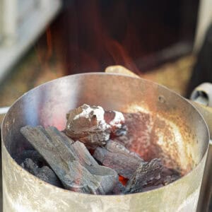 Charcoal in a starter chimney.