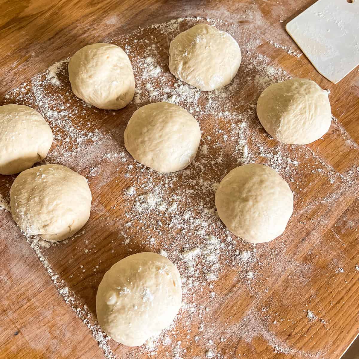 Pitta bread dough balled up ready to flatten.
