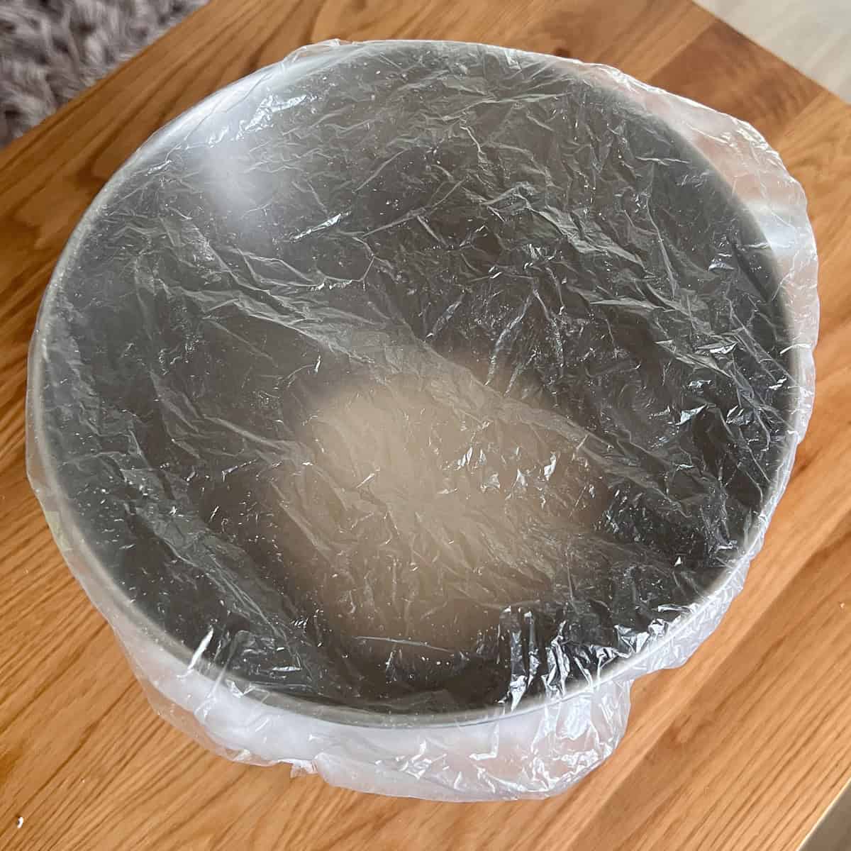 Cover the dough to let it rise.