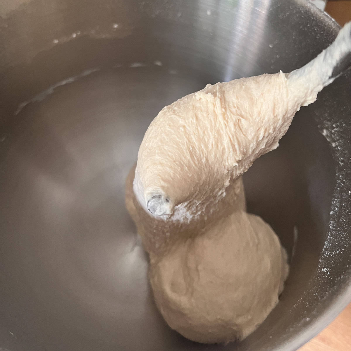 Dough mid way through the mixing process.