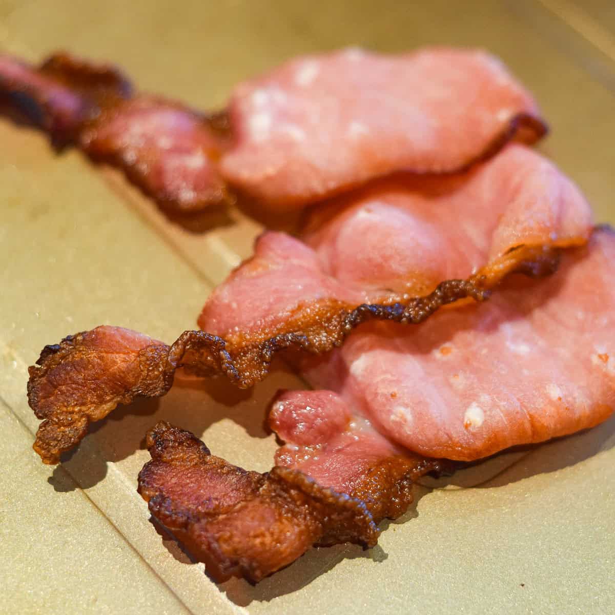 Crispy bacon on a tray.