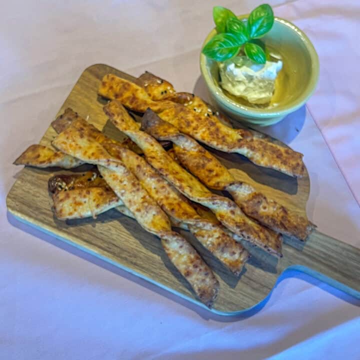 Cheese straws on a platter.