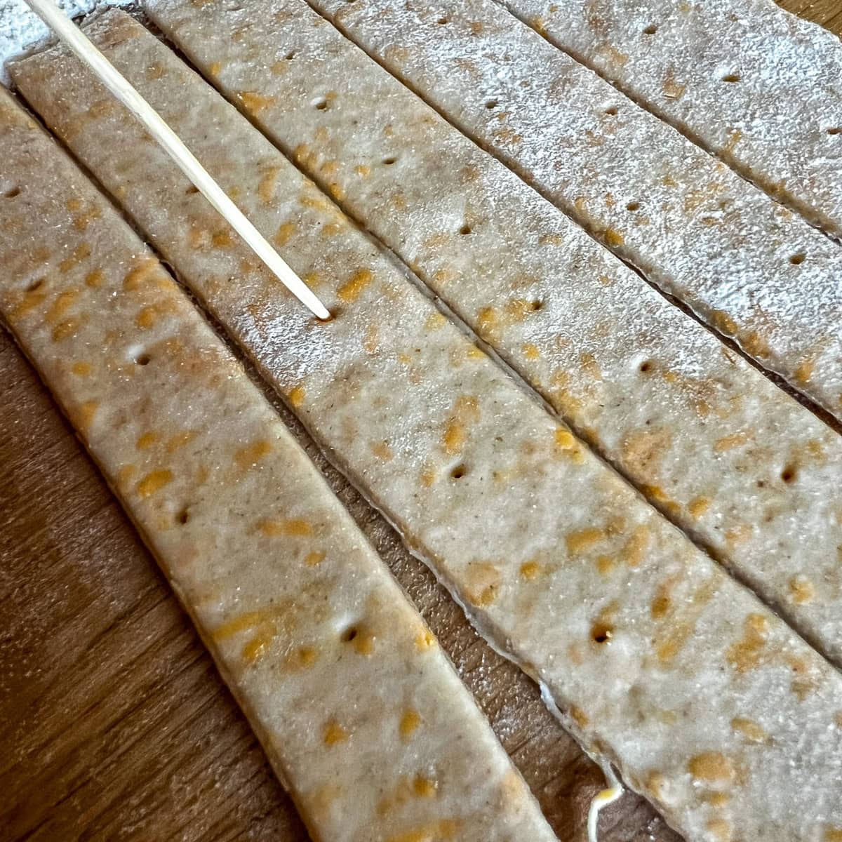 Prick the straws with a cocktail stick before baking.