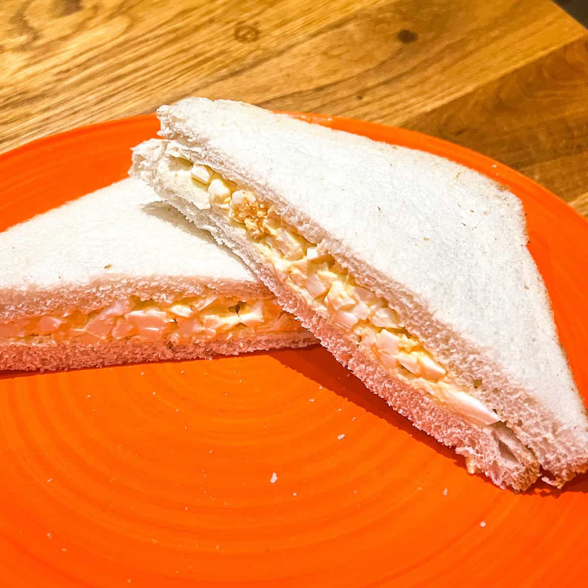 Egg mayo sandwich on a plate.