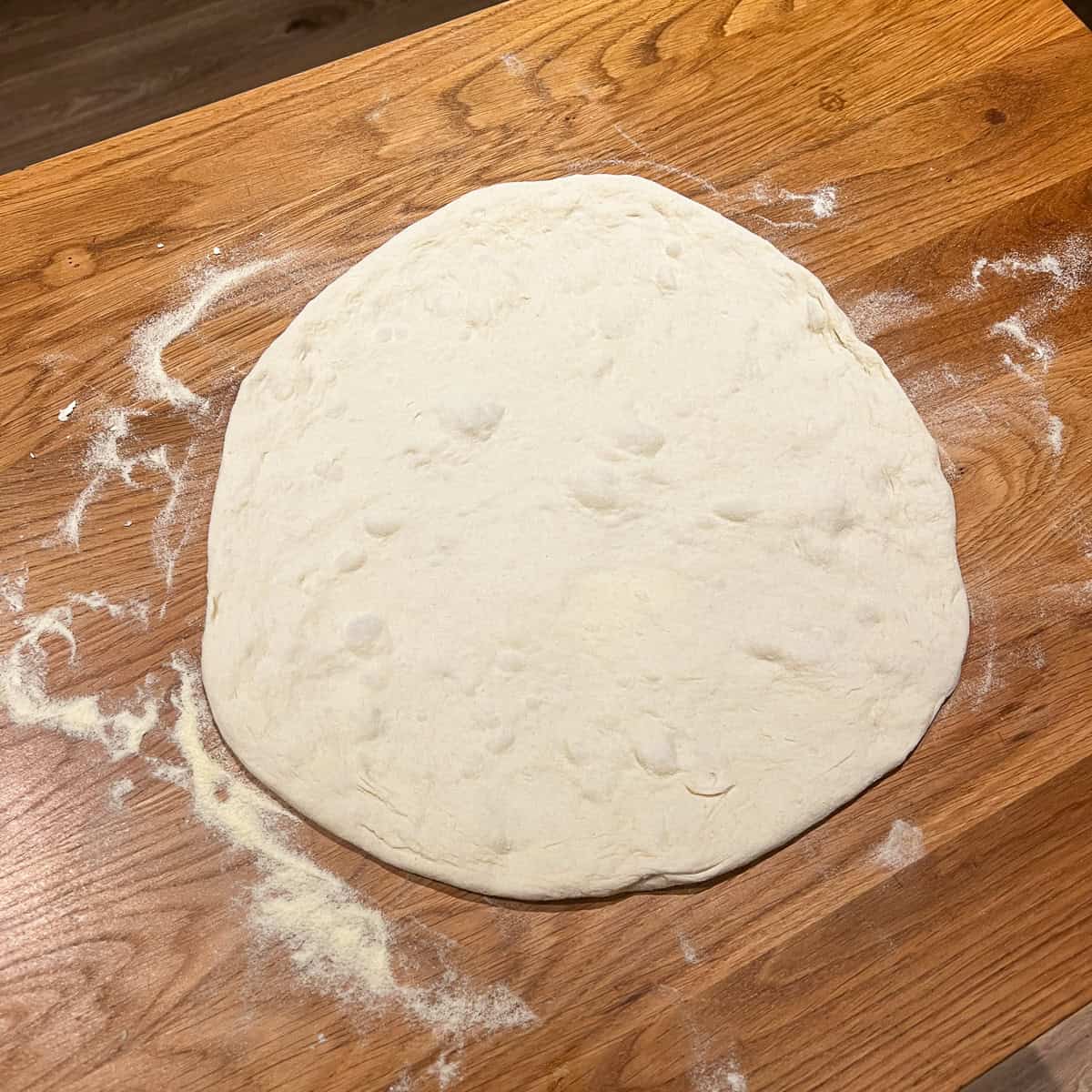 Hand stretched sourdough pizza base.