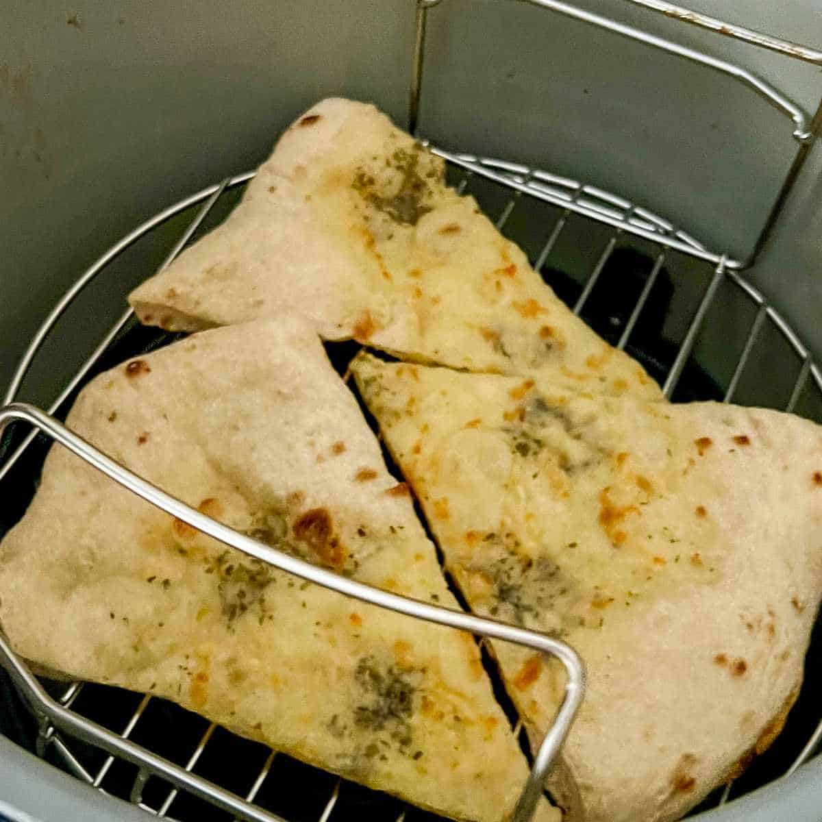 Image of Reheating garlic bread in the air fryer.