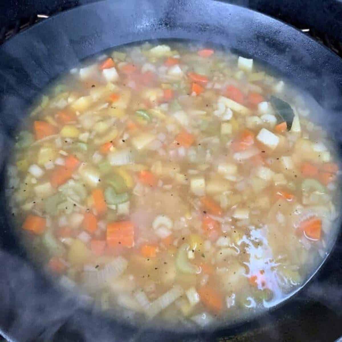 Veg soup simmering in the pan.