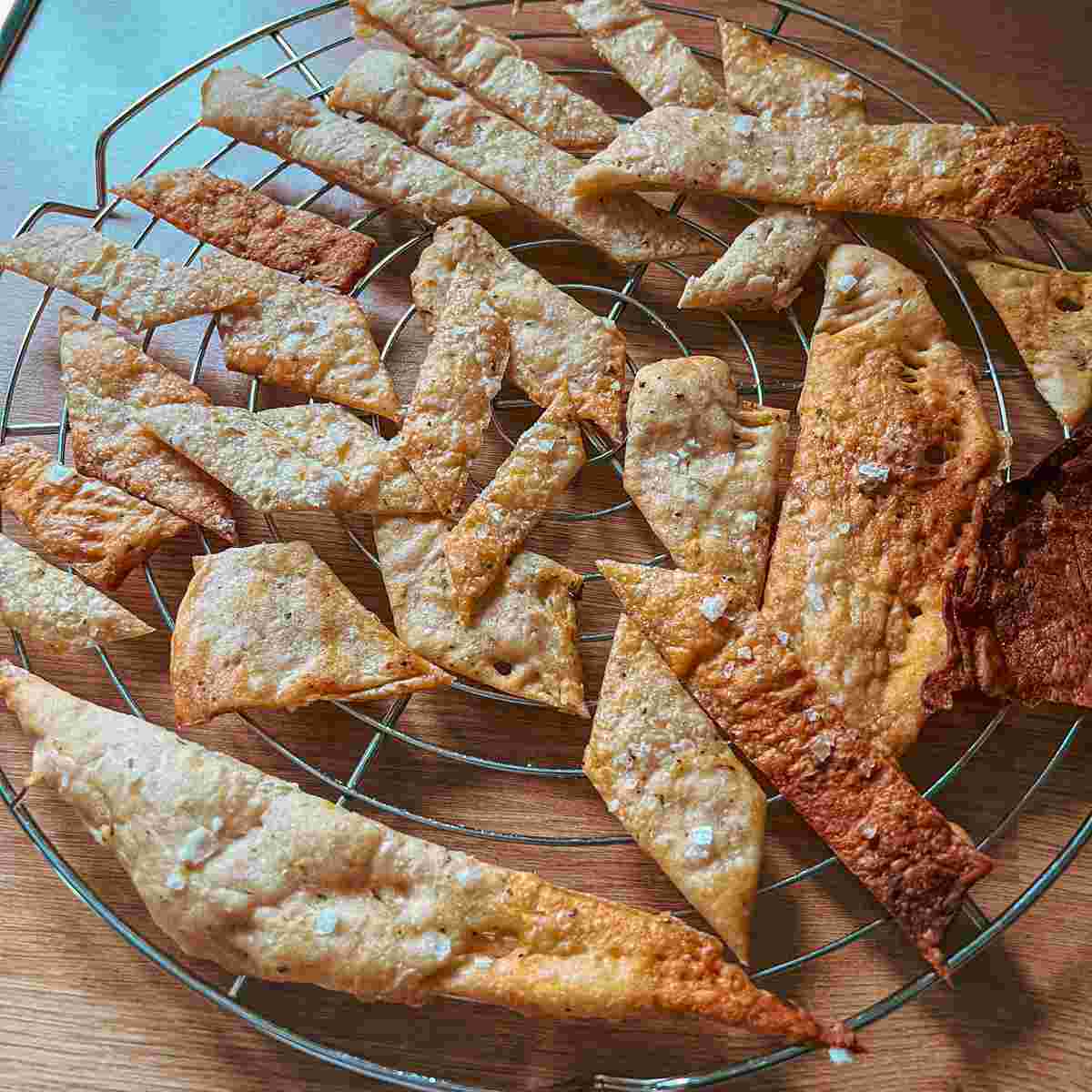 Sourdough discard lemon herb bites cooling on a cooling rack.