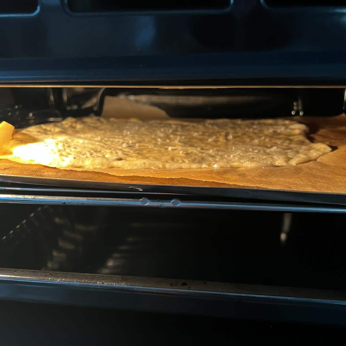 Sourdough discard lemon herb bites cooking in the oven.
