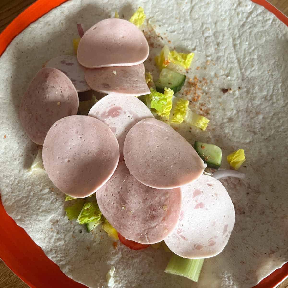 Add the German Sausage meat slices.