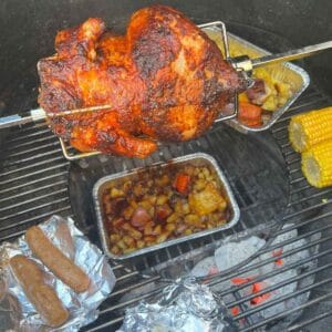 BBQ over charcoal and rotisserie chicken