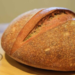 Beetroot Sourdough Bread on a chopping board.
