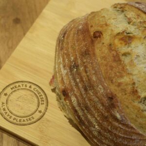 Cheese and Basil Sourdough on meats and cheese chopping board