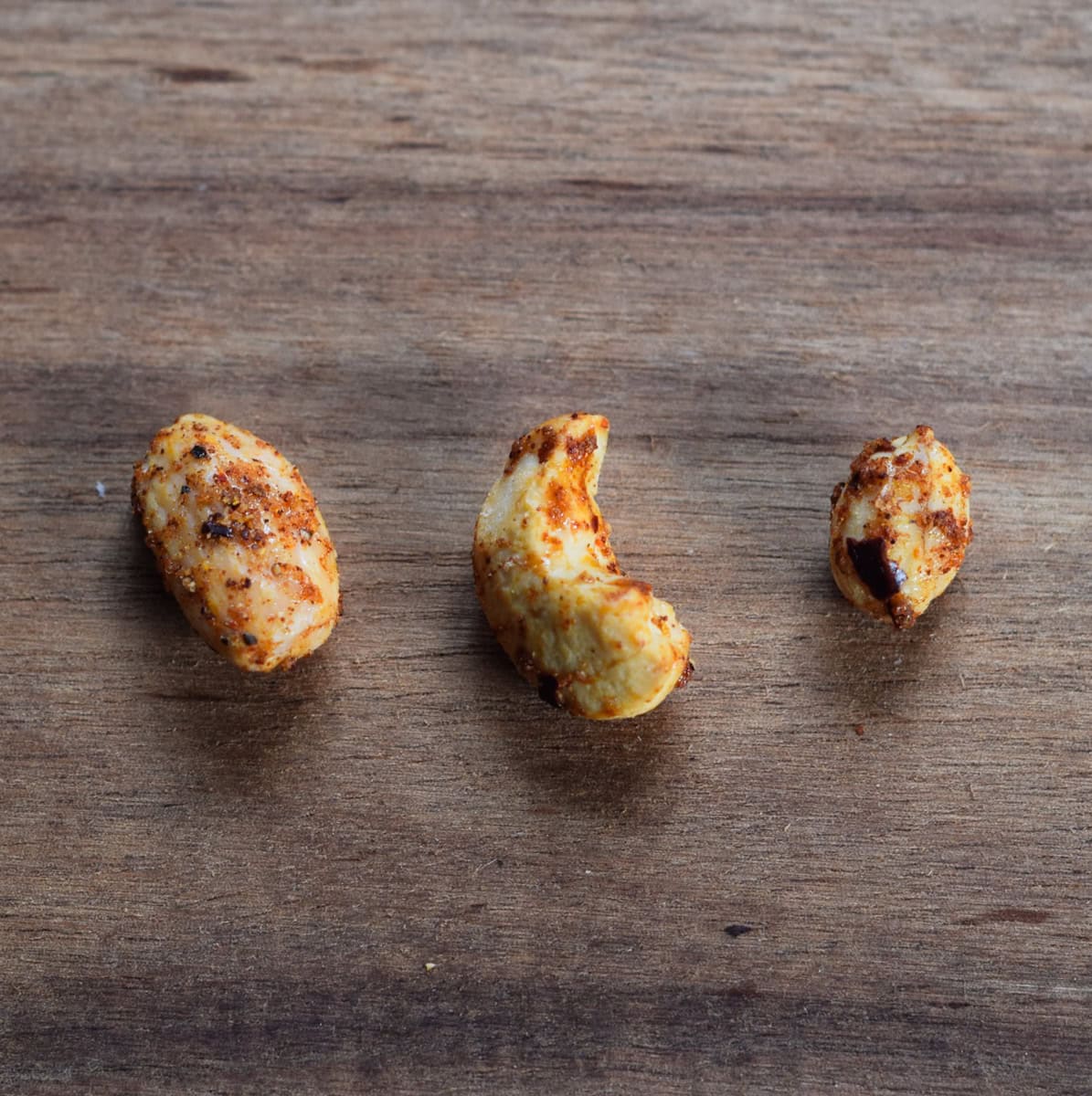 Almond, cashew and peanut coated in spicy Dust Bros coating.