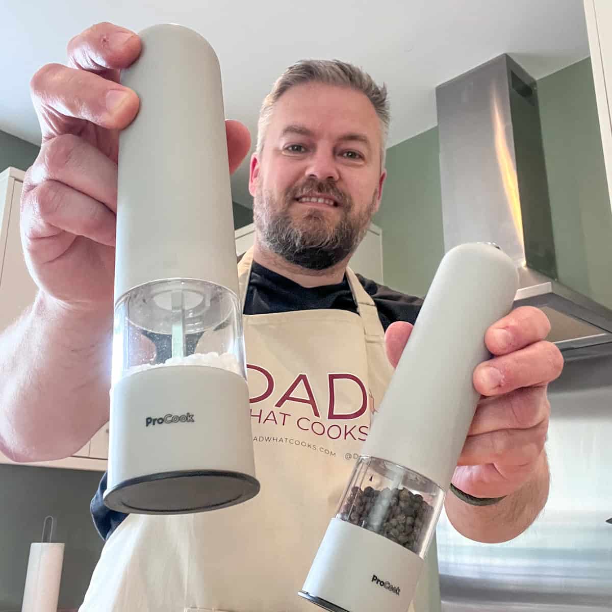 Salt and pepper grinder set for cooking and seasoning. Perfect for home chefs and food enthusiasts.