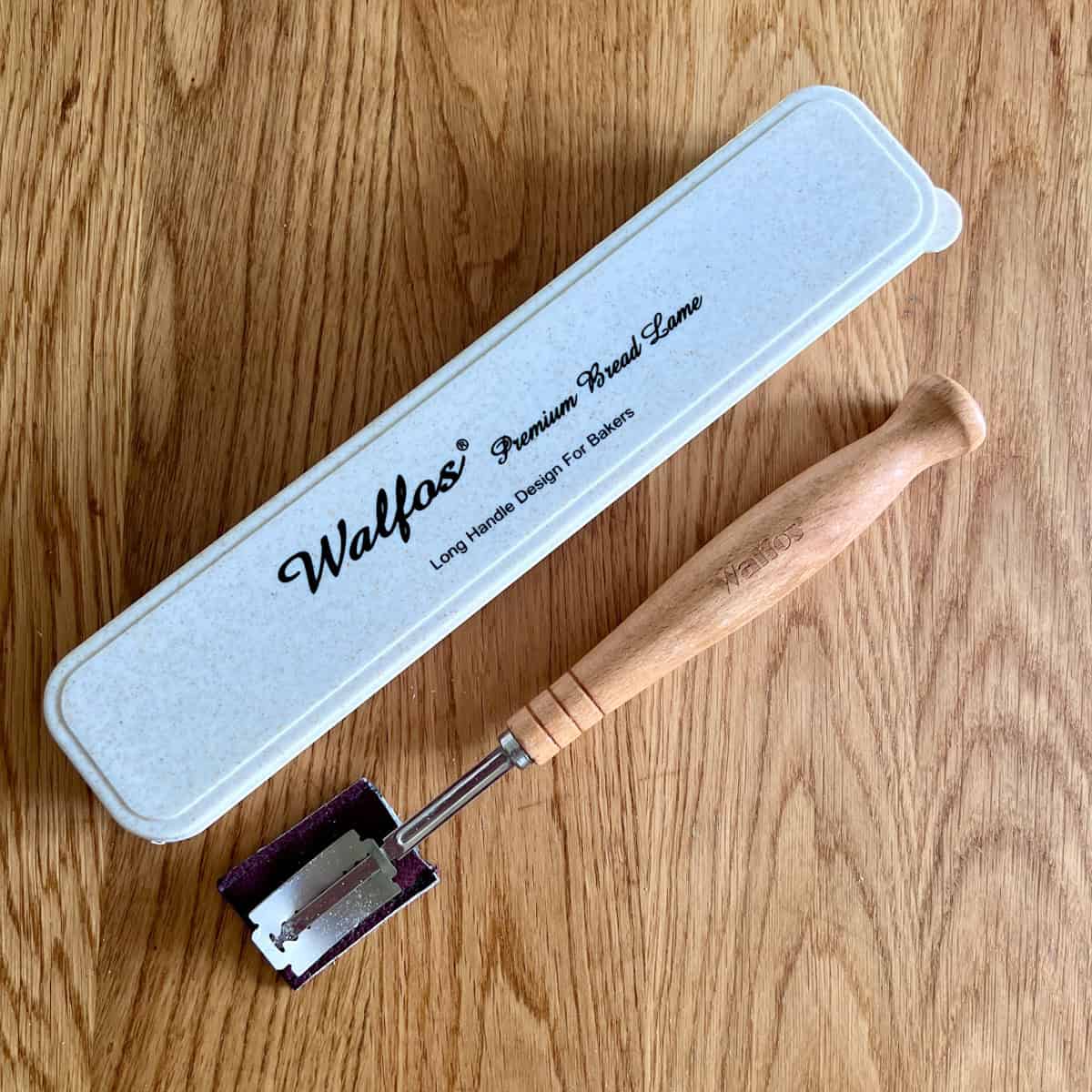 Bakers lame with wooden handle and case.